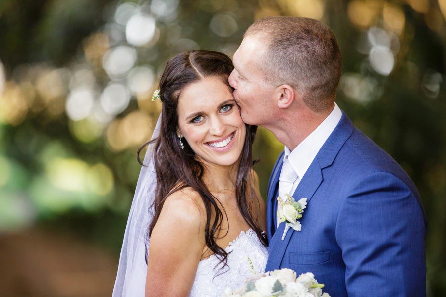 Funny wedding voews bride and groom embracing