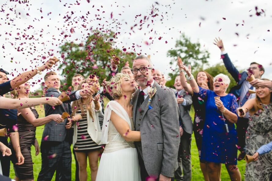 Heap of money with wedding cake topper