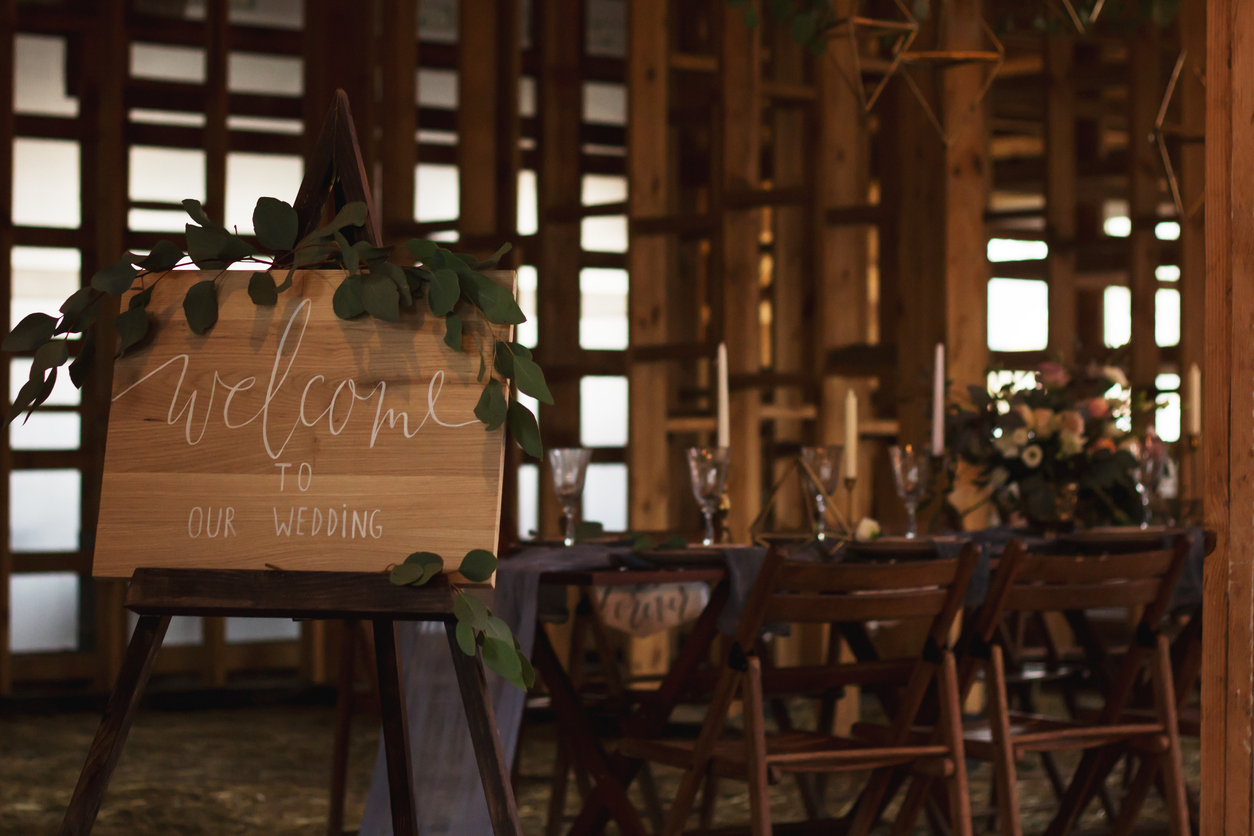 Wedding banquet in a wooden barn.