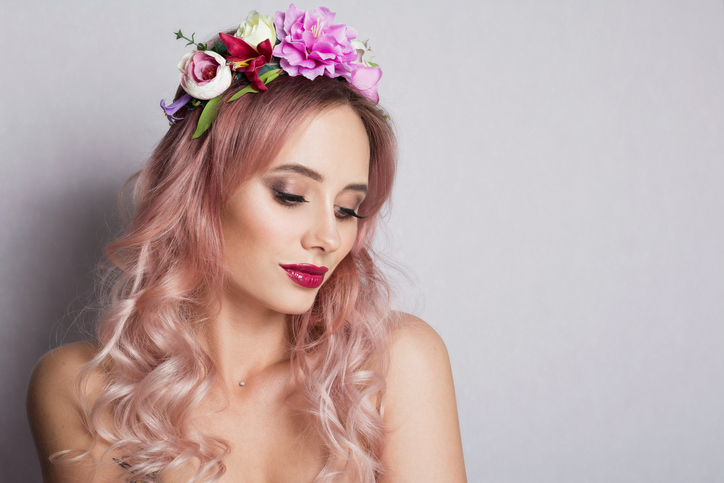 Pretty young woman with Wreath of Pink Flowers