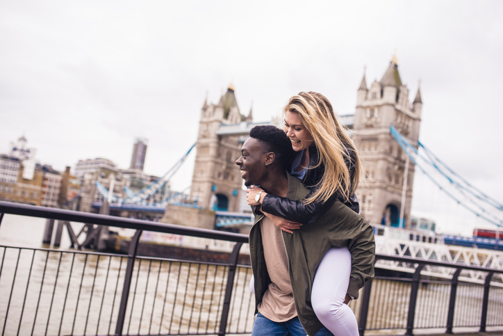 A young couple enjoying each others company outdoors in London