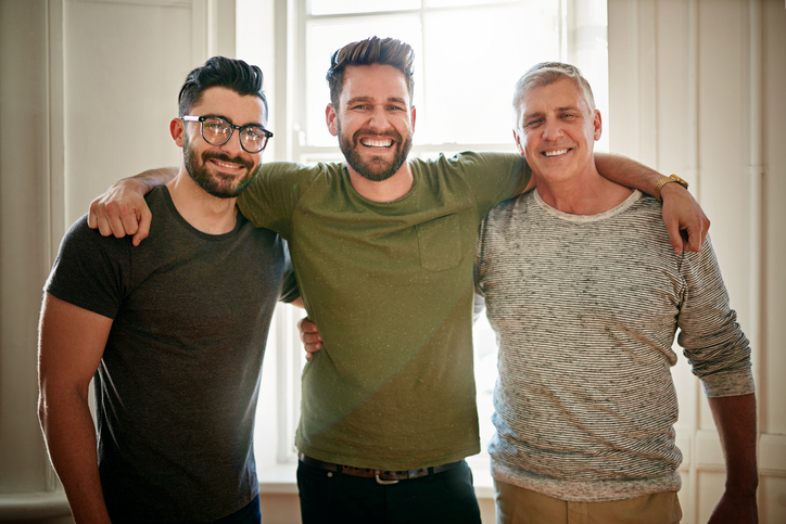 Portrait of a team of happy colleagues working together in a creative office