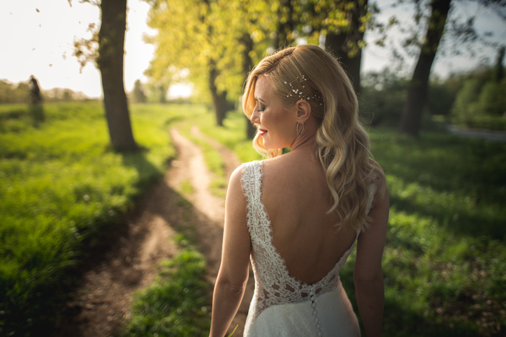 Sensual and elegant bride in the forest