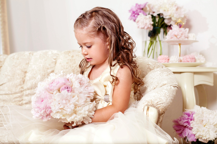 Flower girl with peony bouquet