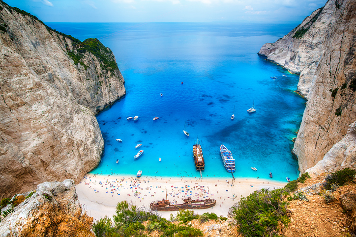 The beach of Navagio with the old shipwreck is one of the main tourism spots of Zakynthos island in Greece - beside of the wreck its the turquoise sea what makes this place so famous.