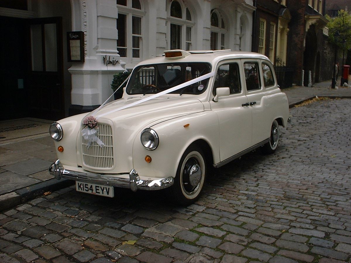 white wedding london taxis, wedding cars east grinstead