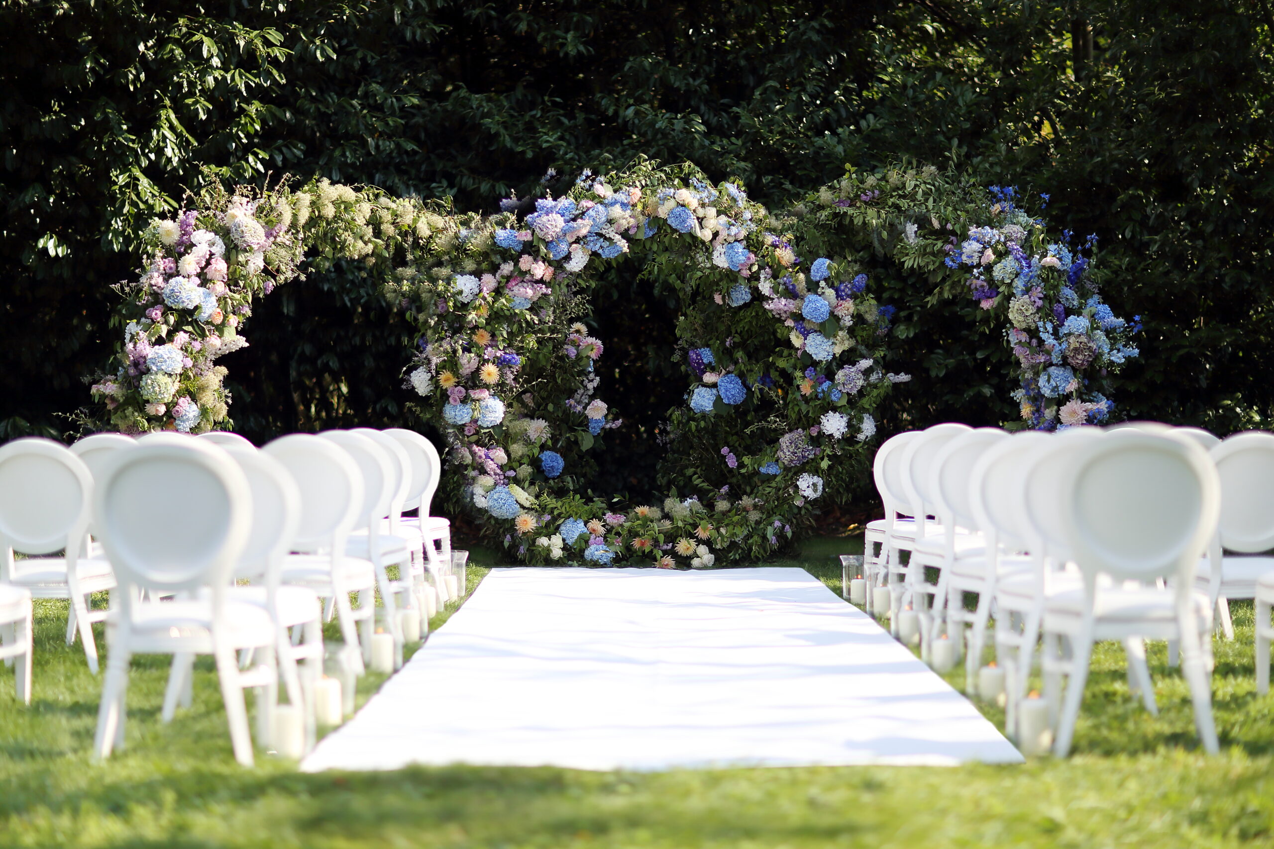 Garden wedding ceremony by Xander Casey