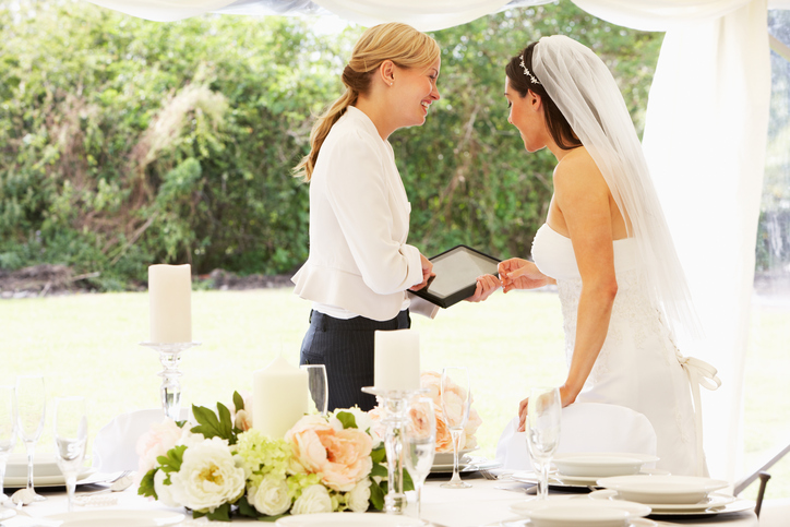 Bride With Wedding Planner In Marquee