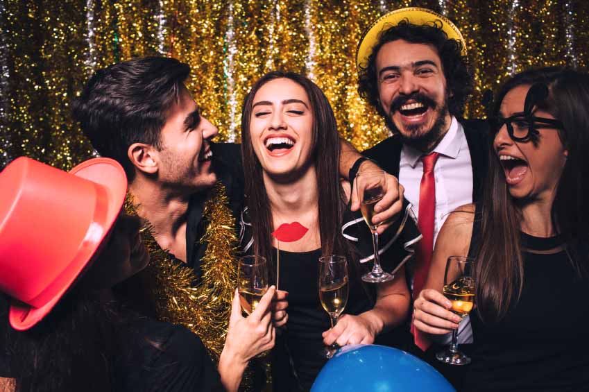 guests enjoying photo booth at party