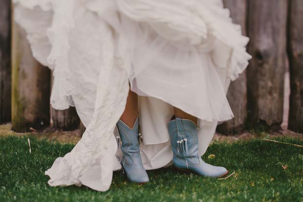 bride wearing blue cowboy boots