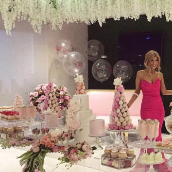 Kat Mehajer poses for a photograph at her elaborate bridal shower