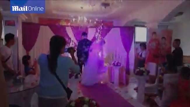 Chinese bride's wedding dress catches fire