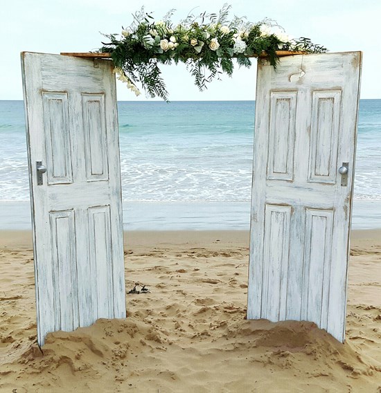 Vintage doors can create the perfect altar space for outdoor ceremonies. Image: Ceremonies, I Do