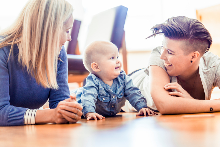 Smiling couple with baby 