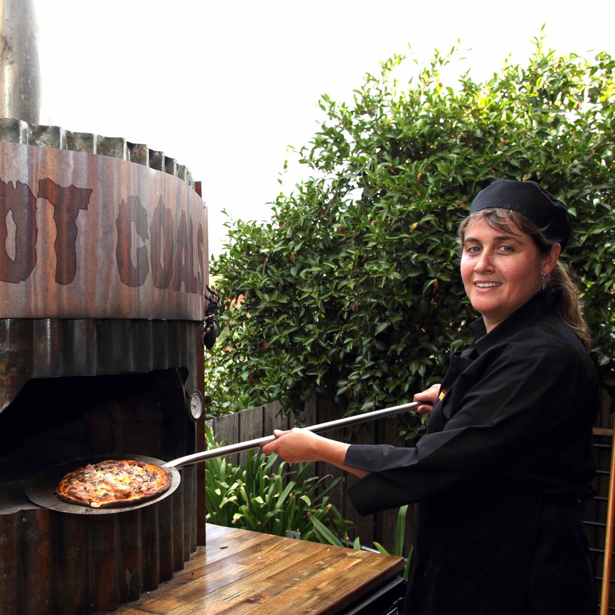 Woodfired pizzas and other creations will delight guests. Image: Hot Coals