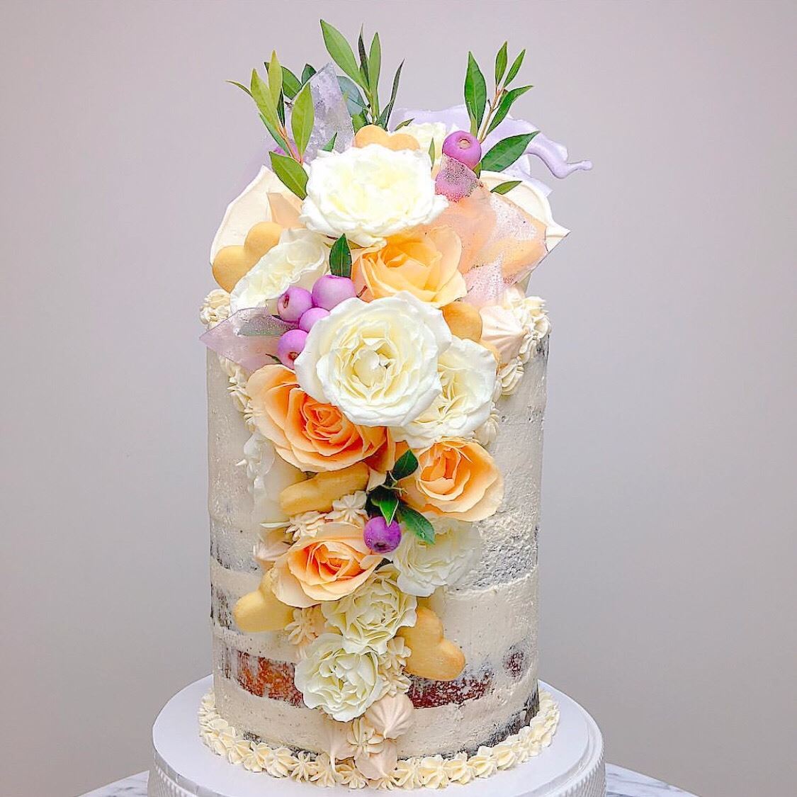 Buttercream is super tasty and works well with flowers. Image: Copper and Cocoa.