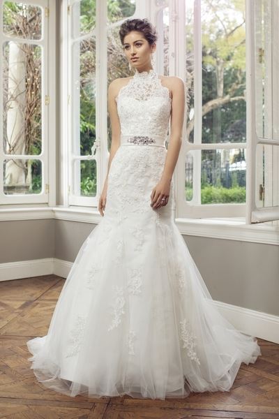 A gorgeous high collared wedding gown by Luv Bridal and Formal.