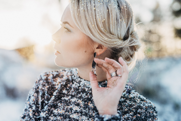 Beautiful woman outdoors in winter