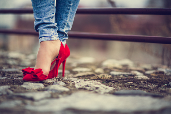 Woman in red shoes