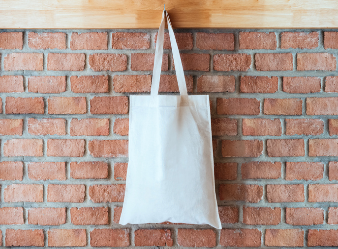 Mock up Cotton Tote Bag on Brick wall Background