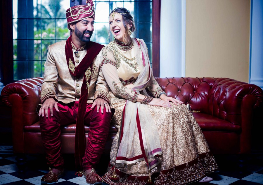 Alexandra and Kamsen wore stunning red and gold wedding outfits.