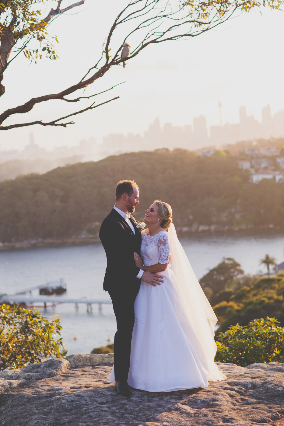 Rebecca and Justin said "I do" with a stunning harbour backdrop. Image: 