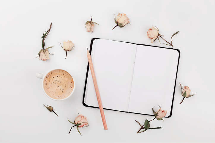 Coffee, empty notebook, dry roses flowers. Cozy Breakfast. Flat lay.