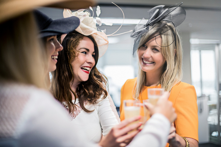 Ladies celebrating the Melbourne Cup in the offfice