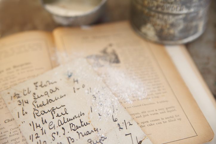 vintage cookbook with handwritten recipe