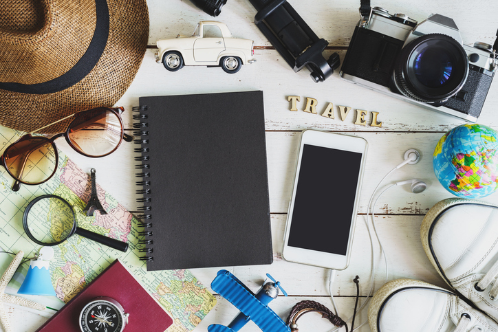 Traveler's accessories and items with black notebook