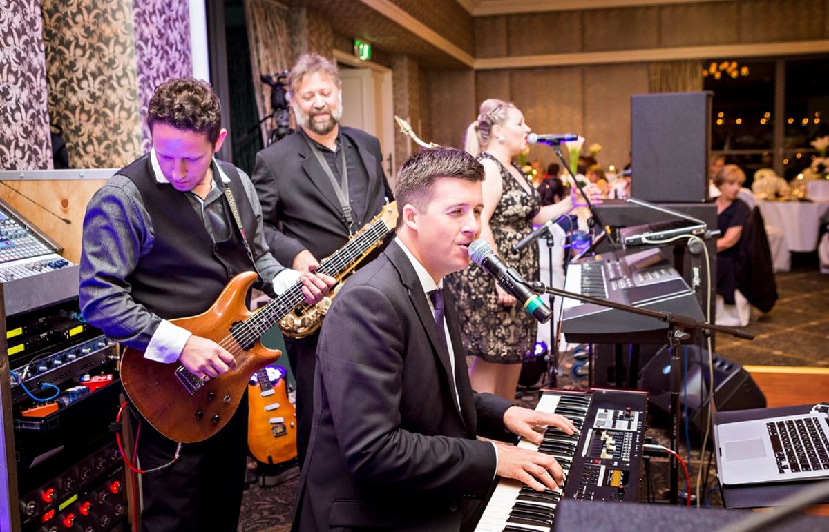 the white tree wedding music providers port douglas