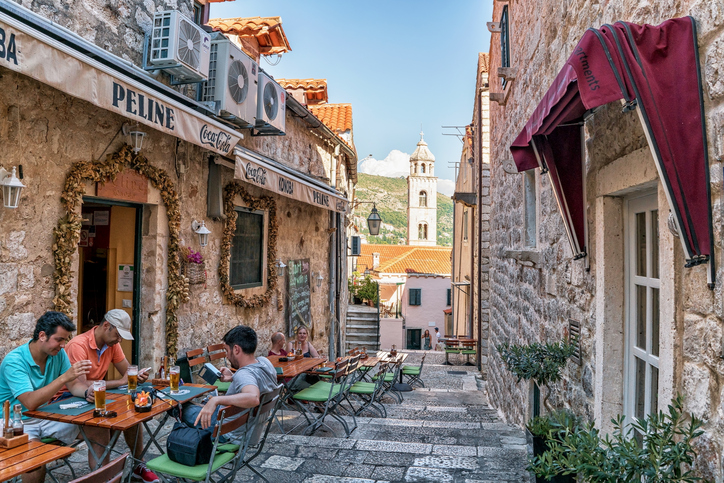 Friends at Open Street terrace cafe in Dubrovnik
