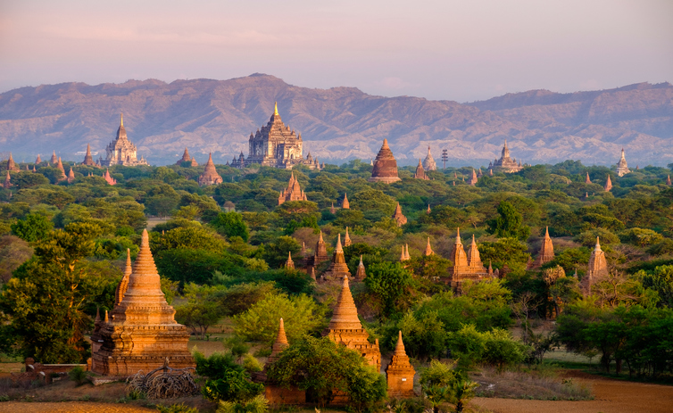 Sunrise landscape view with silhouettes of old temples, Bagan
