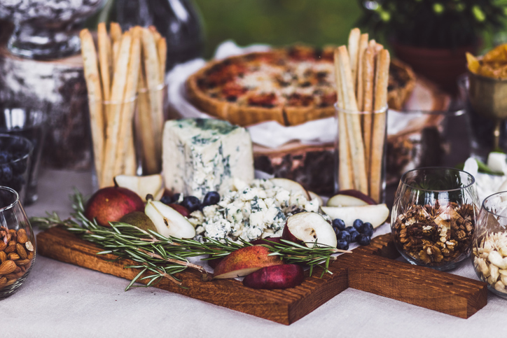 Delicious cheese plate on wedding reception