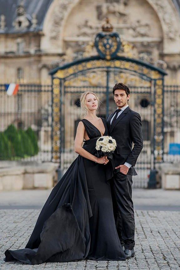 French woman wears black wedding dress