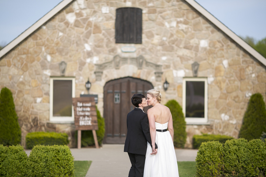 These brides, both named Erin, held an elegant affair at a vineyard in Ontario.