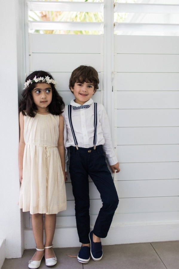 flower girl and page boy hold hands