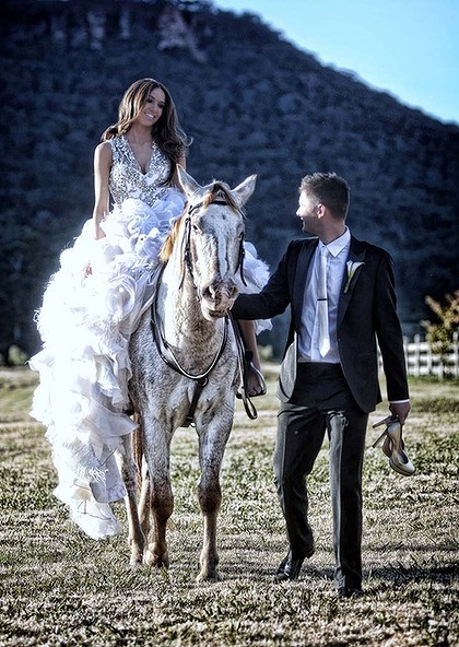 Michael Clarke and his new bride, Kyly Boldly set off into the sunset...