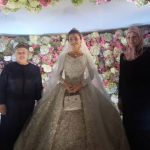 The bride poses for photographs with relatives at her billion-dollar wedding. Image: masusenkie__girls_888 via Instagram