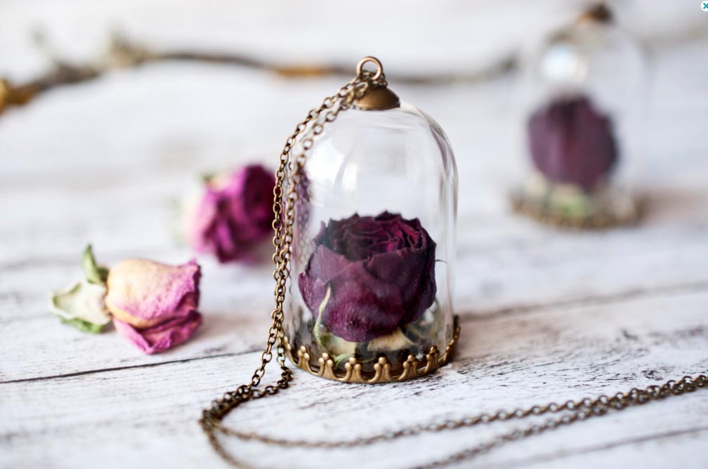 flowers preserved in a necklace