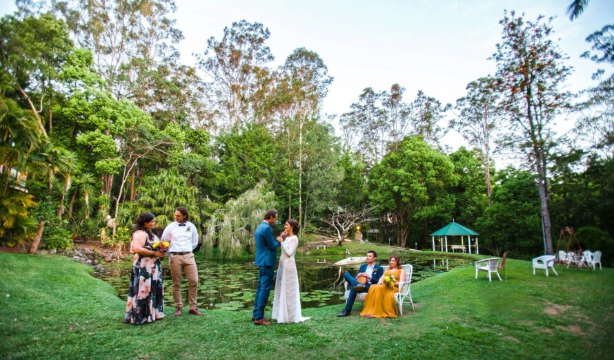 A wedding party enjoy Ecostudio Fellinis beautiful grounds photo by Papillion Studio Photography
