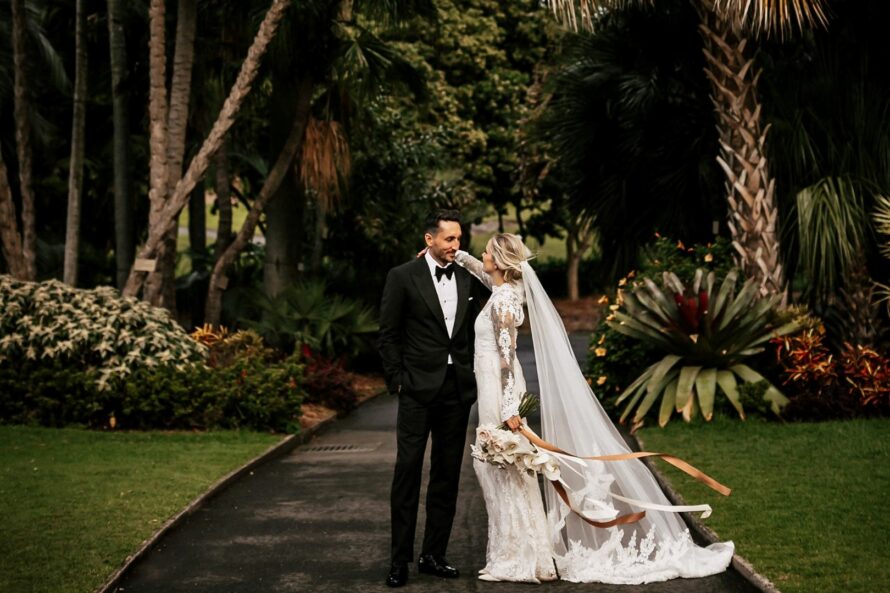 Top garden wedding venues in Sydney with bride and groom in lush gardens