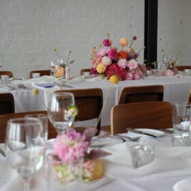 Seasonal wedding flowers adorn the tablescapes