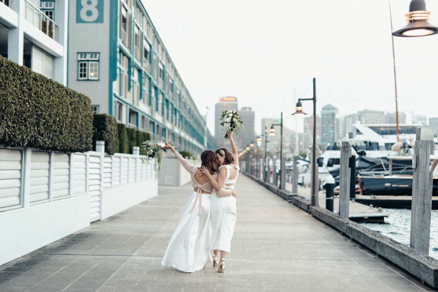 bride and bride walk away together