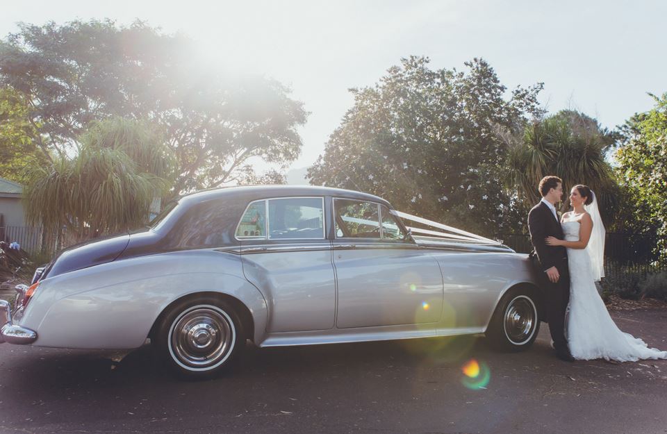rolls royce and couple