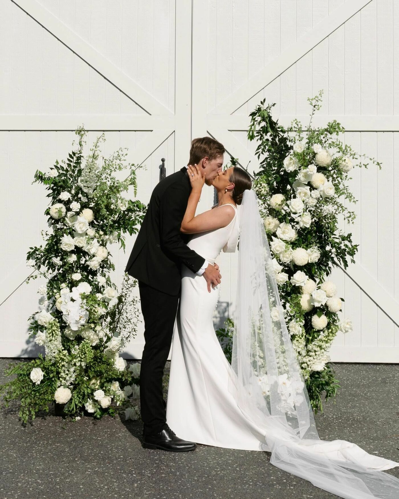 bride looks at herself in the mirror