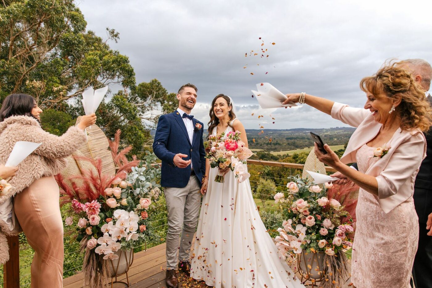 Couple celebrates doing their vows with confetti