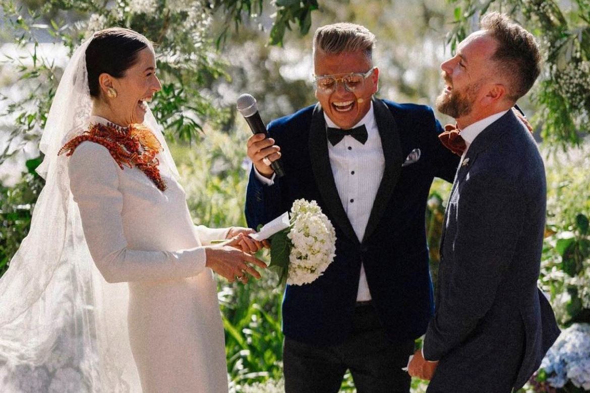 Wedding vows for him as husband and wife get married with laughing celebrant