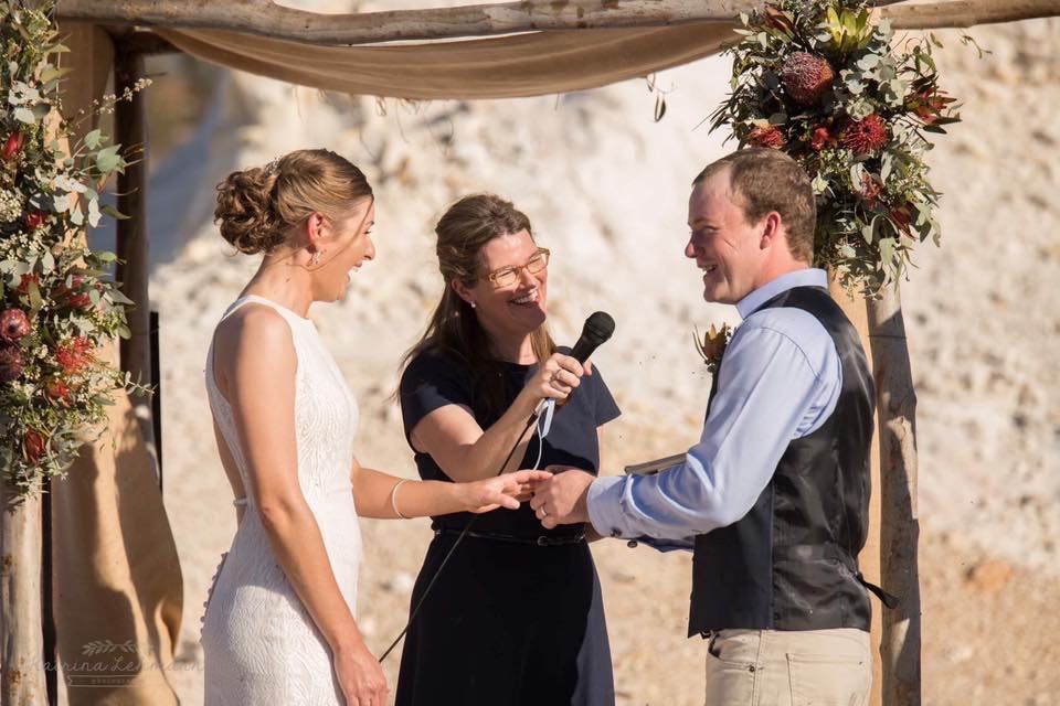 A couple gets married with their celebrant