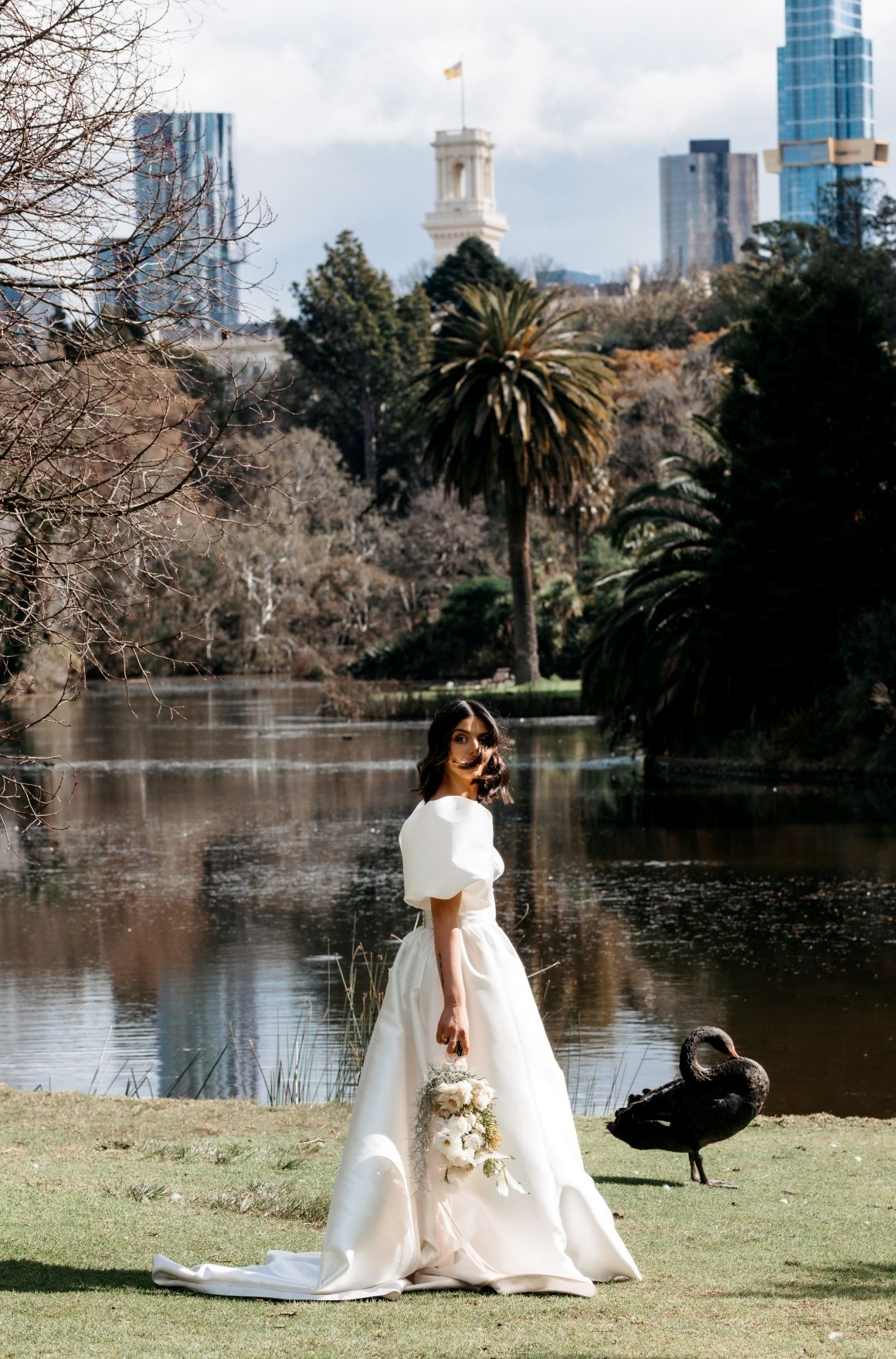 A bride stands in the Royal Botanic Gardens